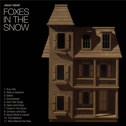 Foxes In The Snow