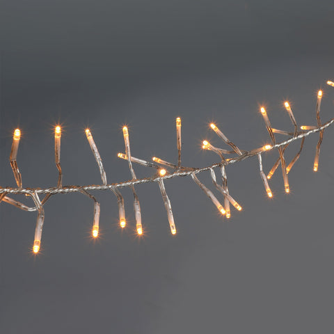 Lexi Lighting 720 LED Cluster Christmas Lights with Clear Cable - Amber