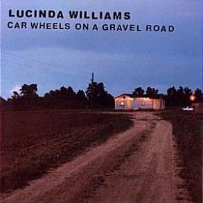 Car Wheels On A Gravel Road